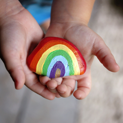 Rock painted as a rainbow