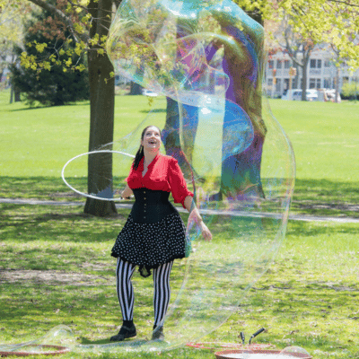 Marvelous Michelle, Bubble Lady Extraordinaire making bubble taller than her.